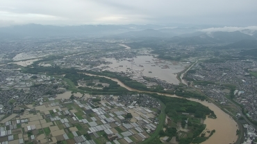 昨年6月豪雨で浸水した豊川流域(提供)